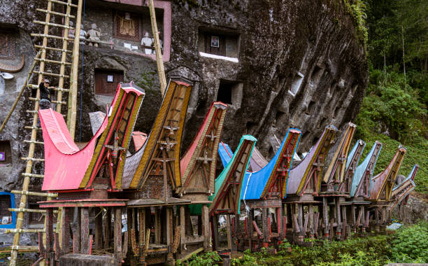istock Java, Indonesia, June 13, 2022 - Toraja homes all follow the same rigid design both in shape and size - looking like a boat 1418109018