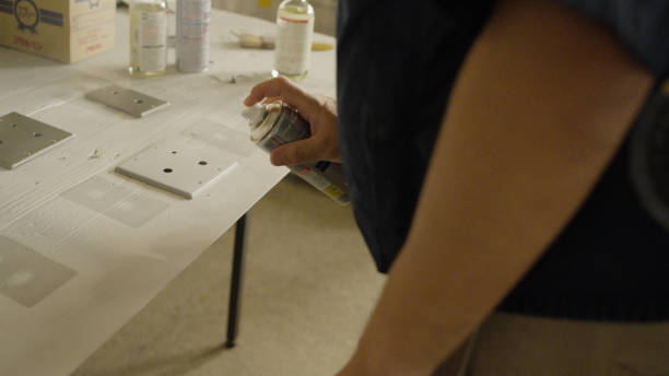 istock The man puts masking tape on. 1418109842