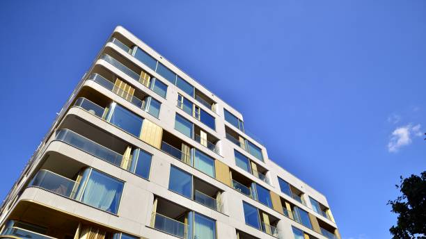 istock Modern luxury residential flat. Modern apartment building on a sunny day. 1418111227