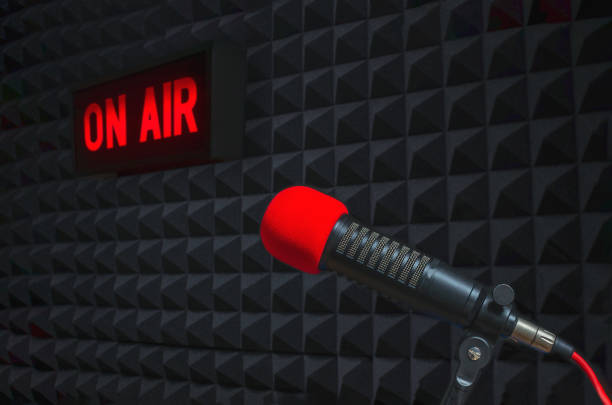 istock Professional microphone and on air sign 1418113999