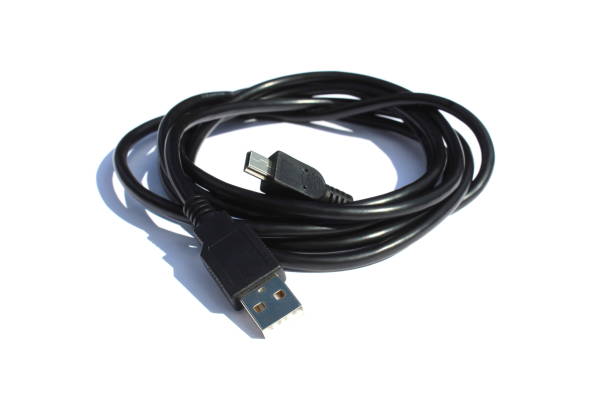 istock The black cable for connection lies on a white isolated background. 1418117213