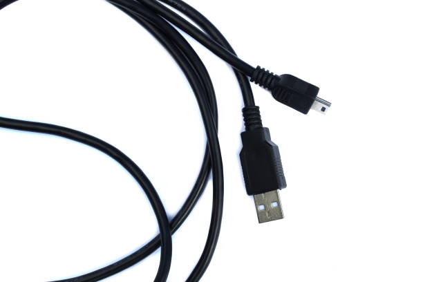 istock The black cable for connection lies on a white isolated background. 1418117214