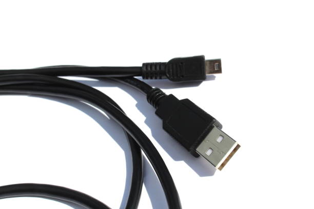 istock The black cable for connection lies on a white isolated background. 1418117218