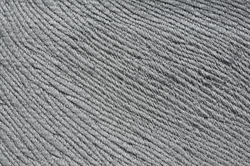 Precise material texture in grey colour. High resolution photo.