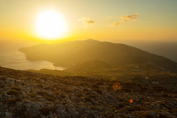 Sunset view from a hill above Chora on North East coast of Folegandros island, Greece.
