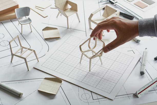 istock Designer sketching drawing design development product plan draft chair armchair Wingback Interior furniture prototype manufacturing production. designer studio concept . 1418120601