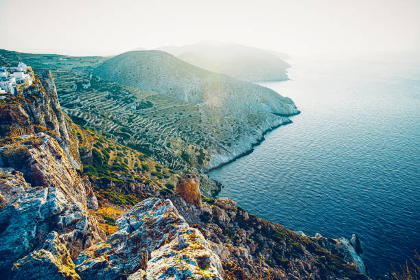Sunset view from a hill above Chora on North East coast of Folegandros island, Greece.