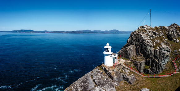 A view of the historic Sheep's Head Lighthouse on the Muntervary Peninsula in County Cork of Ireland