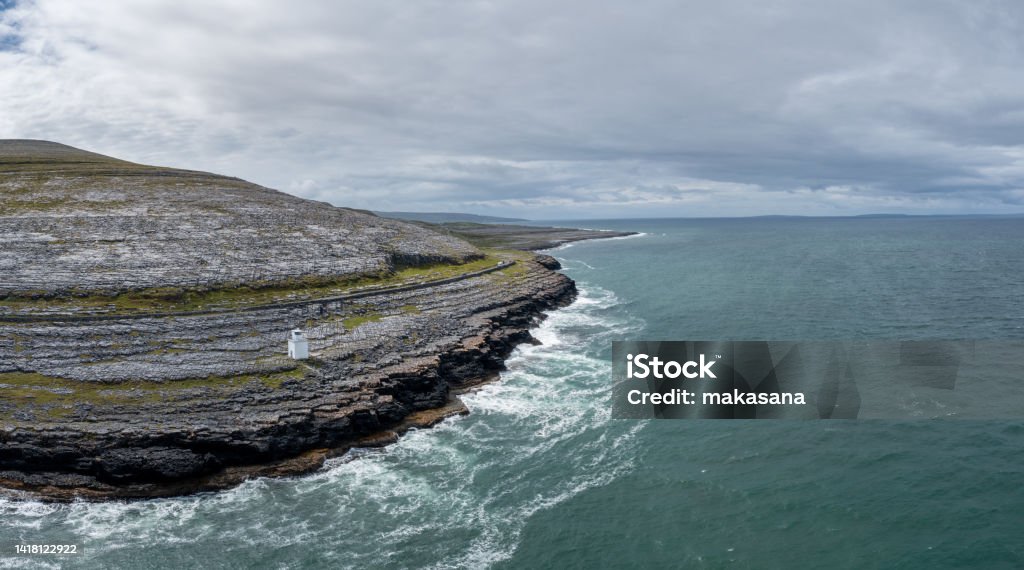 aerial view of the Burren Coast in County Clare with the Black Head Lighthouse on the rocky point An aerial view of the Burren Coast in County Clare with the Black Head Lighthouse on the rocky point County Clare Stock Photo