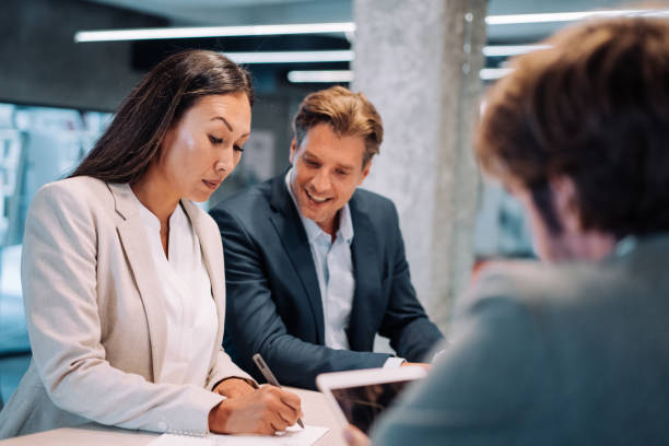 istock Business persons on meeting in the office. 1418128107
