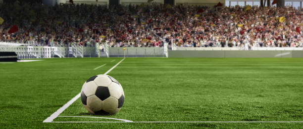 calcio d'angolo. pallone da calcio sdraiato sull'erba del campo da calcio in uno stadio affollato. concetto di sport, campionato del mondo - soccer field soccer corner stadium foto e immagini stock