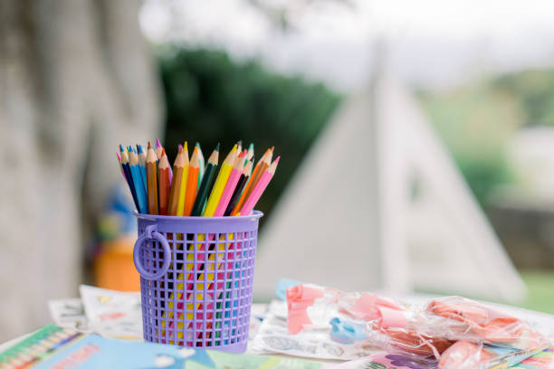 istock Colorful pencils in plastic cup 1418135625