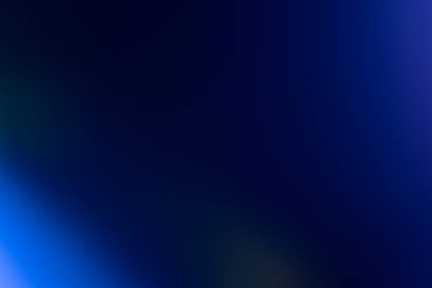 istock blur light overlay bokeh neon glow navy blue flare 1418141020