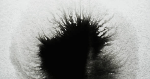 black water ink dirt splatter drop stain blotch stock photo