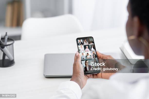 Mobile Video Call Online Meeting Phone Online Team Stock Photo - Download Image Now - Brand Name Smart Phone, 14-15 Years, Device Screen