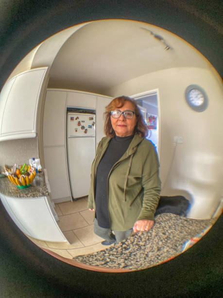 istock Fisheye portrait in domestic kitchen 1418143447