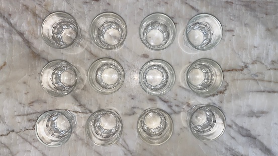 12 empty glasses