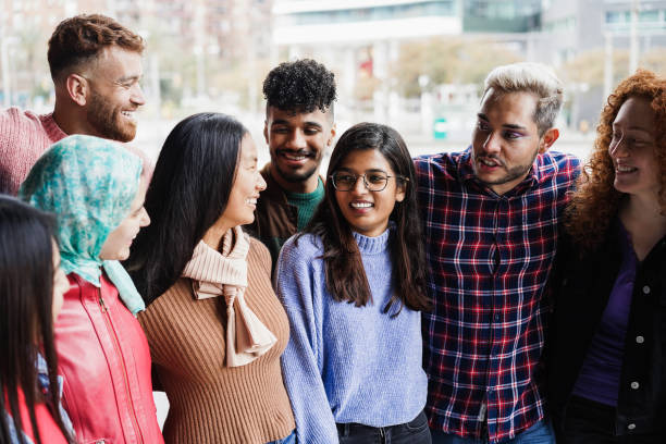 istock Young diverse people having fun outdoor laughing together - Diversity concept 1418146487