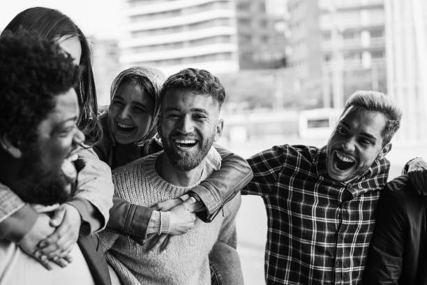 istock Young diverse people having fun outdoor laughing together - Diversity concept 1418146512