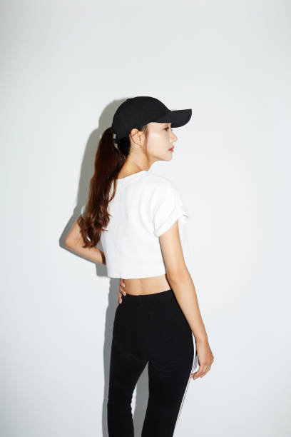 young asian woman in sporty fashion - profile photo flash imagens e fotografias de stock