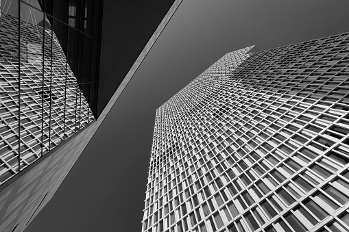 Black and white photograph of new office buildings with reflections, Frankfurt, Germany