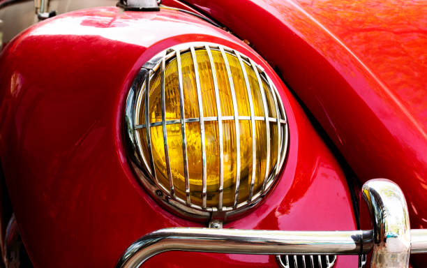 istock Close up headlamp red retro car 1418153301