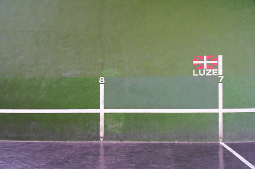 Green wall of a Basque pediment. Traditional Basque pelota sport