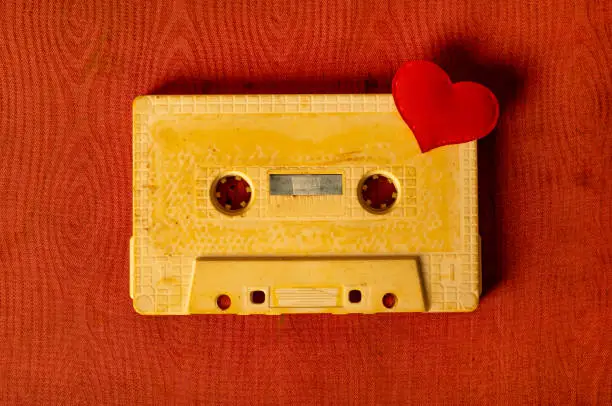 Toned Photo of the Old Audio Tape Cassette with a Red Heart