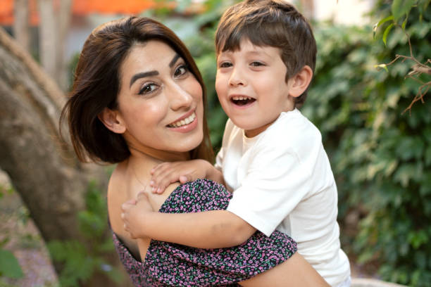 Small son and young mom happiness