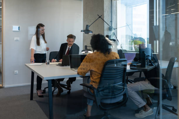 istock Business people working at a modern office 1418161339