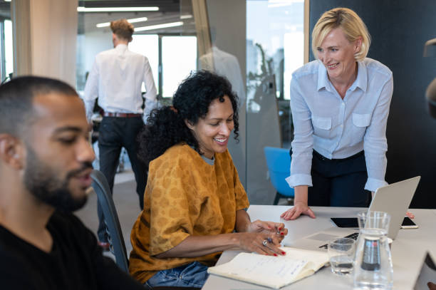 istock Business people working at a modern office 1418165323