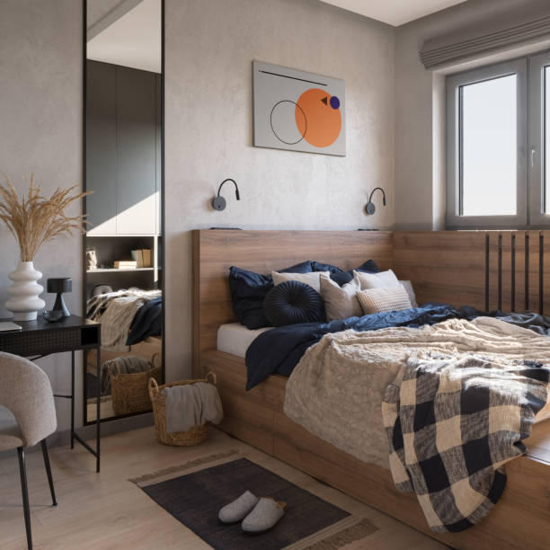 istock Stylish bedroom with bed in wooden frame 1418165517