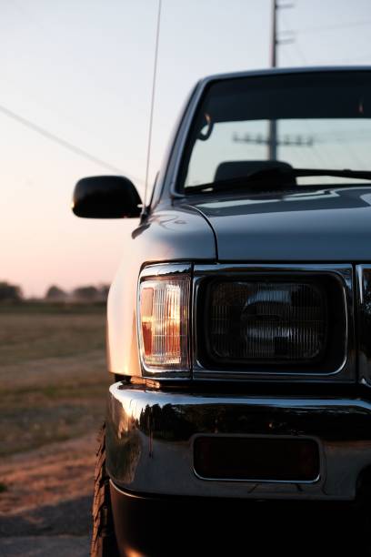 istock Vertical closeup of a car headlight 1418166901