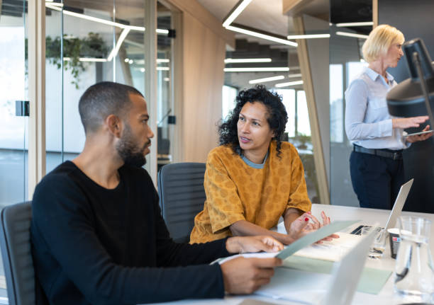 istock Business people working at a modern office 1418168720