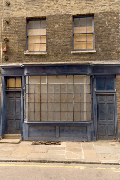 istock old house facade store doors abandoned barred 1418168743