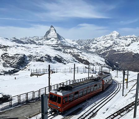A cable car at the ski resort of Zermatt in Switzerland, with the peak of the Matterhorn in the background.