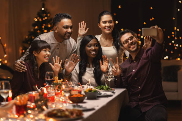 istock friends taking selfie on christmas dinner at home 1418170874
