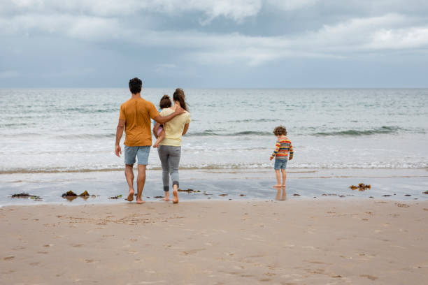 istock Family Visiting the Coastline 1418171276