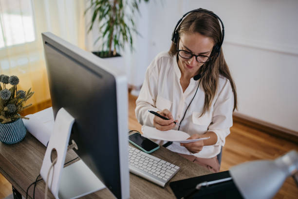 istock Woman working from home on computer and having remote meeting 1418171332