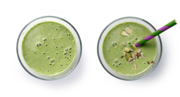 istock Green smoothie detox drink isolated on white 1418172429