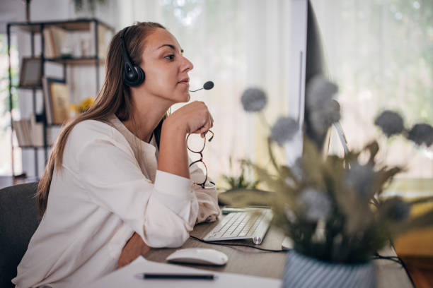 istock Woman working from home on computer and having remote meeting 1418172923