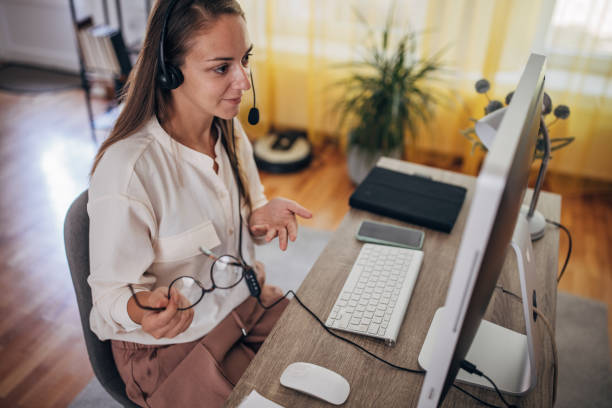 istock Woman working from home on computer and having remote meeting 1418173118