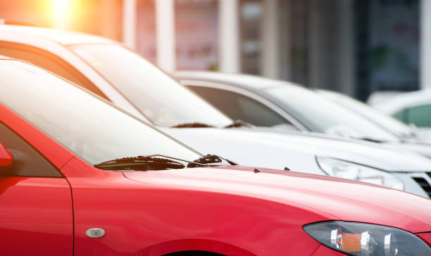 istock many cars parked in a row. 1418173691