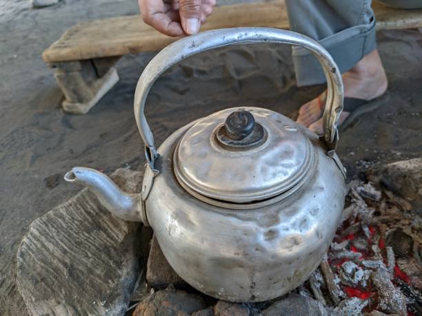 istock Metal kettle on the fireplace 1418174540