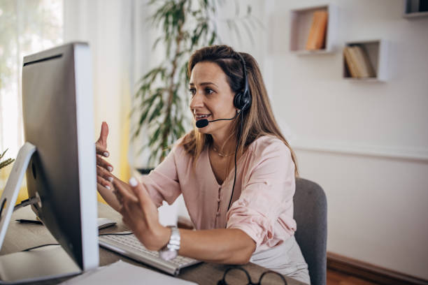 istock Woman working from home on computer and having remote meeting 1418176399