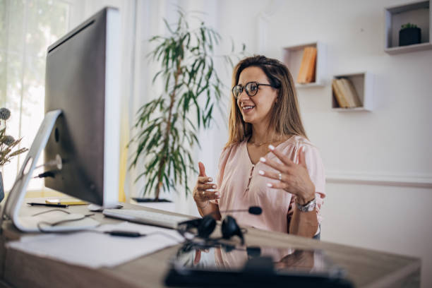 istock Woman working from home on computer and having remote meeting 1418177061