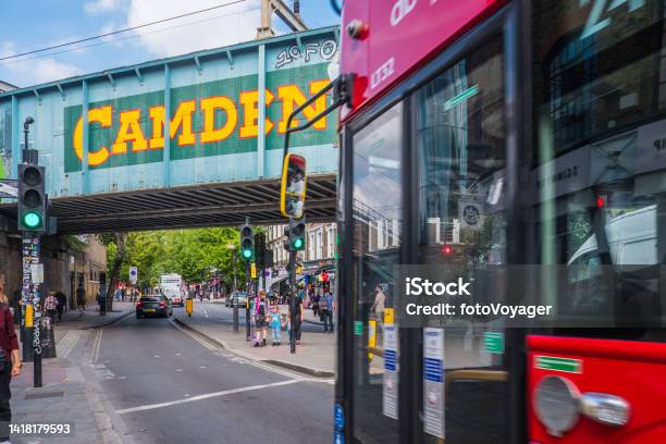 London Red Double Decker Bus Zooming Through Busy Camden Streets Stock Photo - Download Image Now