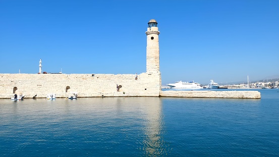 Crete, Greece: Egyptian lighthouse of the old venetian port of chania in the evening.