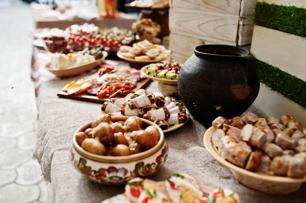 istock Buffet table of reception with cold snacks, meat and salads. 1418184521