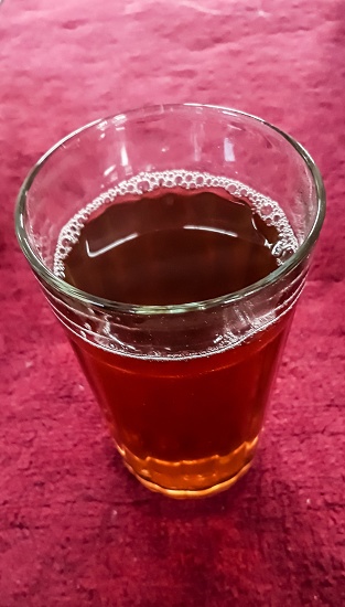 A glass of tea as a traditional Indonesian drink, taken from the close-up angle
